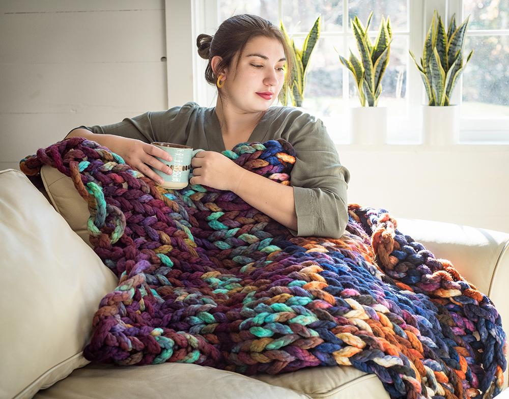 Multi colored chunky knit throw.