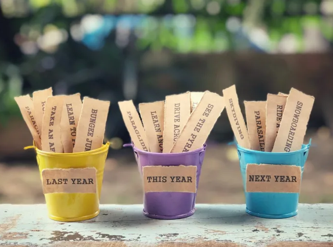 Small self-crafted buckets with yearly goals - bucket list.